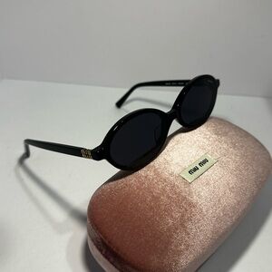 Miu Miu Black Oval Regard Sunglasses